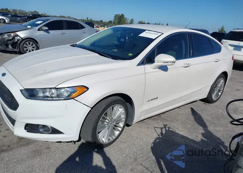 2013 Ford Fusion Hybrid Se z USA, uszkodzony, nr VIN 3FA6P0LU1DR265994